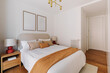 © Nibuya Qubik/Stocksy - A modern and spacious bedroom