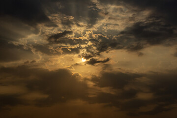 Wall Mural - sunset sky with cloud and sun ray. sunset sky background.