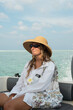 © Alina Hvostikova/Stocksy - Enjoying a sunny boat ride on clear turquoise waters