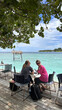 © Alina Hvostikova/Stocksy - Enjoying a relaxing afternoon at a Rasdhoo island cafe in Maldives