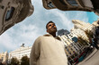 © Jimena Roquero/Stocksy - Fisheye. Modern portrait of man in Madrid city street