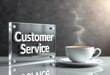 © Vladimir - Illuminated Customer Service sign with steaming coffee for business websites