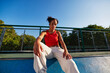 © Javier Díez/Stocksy - Cool woman on skate ramp