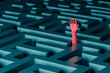 © Marcos Osorio/Stocksy - Hand reaching out for help in a complex maze structure