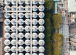 © Lawren Lu/Stocksy - Overhead View of Industrial Brewing Tanks in Modern Brewery