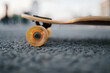 © Alexey Kuzma/Stocksy - longboard on the street