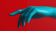 © Marcos Osorio/Stocksy - Glazed glass hand gesture against a vibrant red backdrop