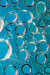 © Ron Mellott/Stocksy - Blue condensation bubbles adhering to inside plastic bottle macro