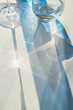 © Marta Mauri/Stocksy - Reflections and shadows of crystal glasses