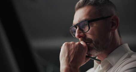 Fototapete - Business, thinking and night with man, creativity and architecture with construction planning. Evening, choice and employee with ideas, designer and deadline with engineering and problem solving
