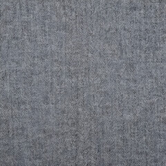 Light grey woolen or tweed fabric for grunge background