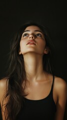 Poster - A woman looks up with a questioning expression on her face