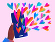 © Marusya Wrobel/Stocksy - Colorful hearts symbolize love from a phone