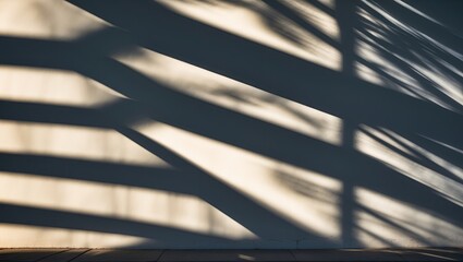 Poster - Shadows casting intricate diagonal stripes on a textured light beige wall with soft natural light creating dynamic patterns and contrasts.