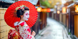 Elegant geisha in traditional kimono with red parasol standing in a picturesque Japanese alley adorned with lanterns - tradition and japanese culture concept