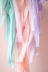Poster - Pastel-colored streamers hang delicately in a soft-focus arrangement, creating an elegant backdrop ideal for text placement, enhancing any festive atmosphere
