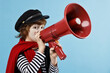 © New Africa - Cute boy in mime costume with megaphone on light blue background. Surprise party