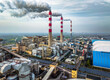 © zhao dongfang - Aerial view of coal power plant with smoke emission in industry area