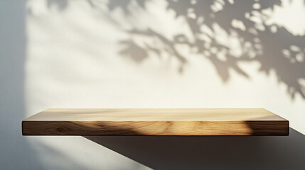 Poster - Empty light wooden shelf against a white wall with shadows of leaves room home clean style decor