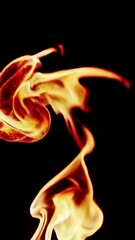 Poster - Dynamic flames dancing on dark background in slow motion with fluid movement