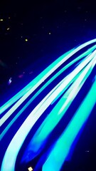 Poster - Dynamic streaks of light create mesmerizing blue patterns in night sky