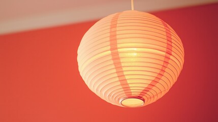 Poster - Elegant white paper lantern hanging beautifully from a ceiling creating a soft ambient glow