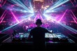 © Masque - The energetic DJ mixes tracks live, delivering an unforgettable experience under colorful lasers.
