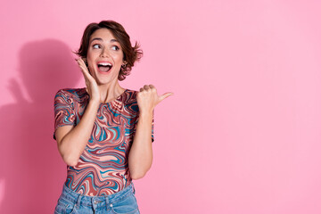 Aufkleber - Photo of cheerful glad cute girl wear stylish clothes look offer empty space isolated on pink color background