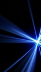 Poster - Dynamic blue light beams radiating across dark background in energetic motion