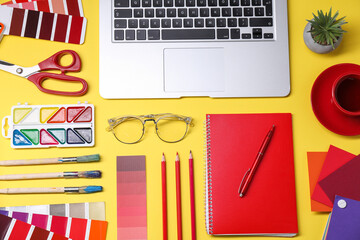 Aufkleber - Designer's workplace. Flat lay composition with stationery, laptop and cup of coffee on yellow background