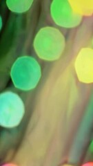 Poster - Vibrant colorful light bokeh transition with dynamic movement and soft rainbow hues