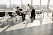 © 4Max - Two office workers working together