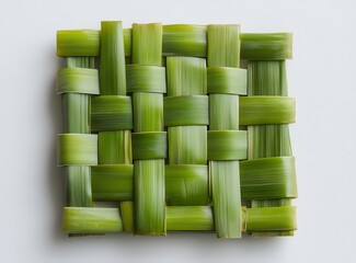 Poster - Intricate Weaving of Green Leaves Creating a Textured Surface Suitable for Decorative or Culinary Presentation