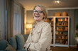 © Migma_Agency - Portrait of a mature woman in a jacket with crossed arms