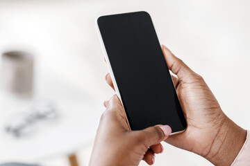 Fototapete - Mockup image of smartphone with black screen in hands of unrecognizable black woman, closeup