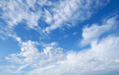 Wall Mural - beautiful blue sky with soft white clouds for abstract background