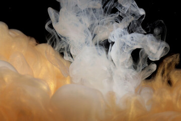 Wall Mural - abstract soft focus blur smoke background. ink colors blot in water. yellow, gold, black tone.