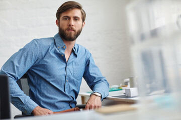 Poster - Businessman, professional and portrait in office for startup, creative agency and serious with confidence. Workplace, male person and designer with ambition for company growth, entrepreneur and job