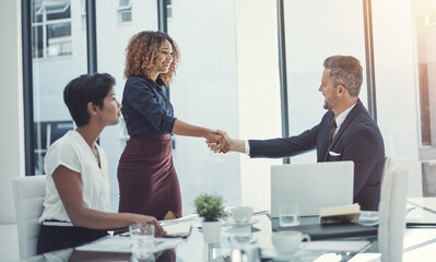 Poster - Shaking hands, greeting and business people in meeting with laptop in office for investment partnership. Welcome, smile and finance managers with client for handshake with financial deal or contract