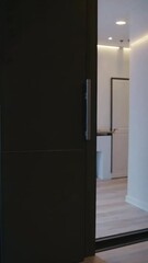 Poster - Modern smart home entrance with digital control panel activating