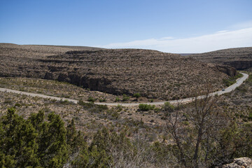Wall Mural - Two-lane road through Carlsbad Caverns National Park, New Mexico