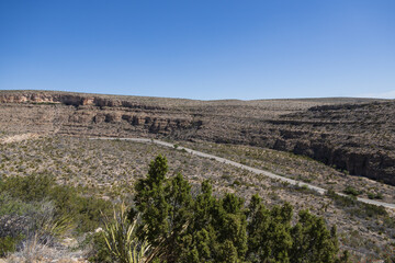 Wall Mural - Two-lane road through Carlsbad Caverns National Park, New Mexico