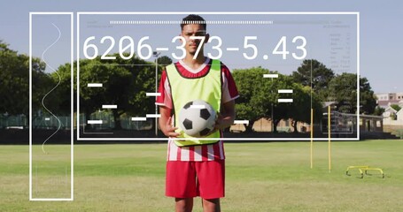 Poster - Soccer player holding ball with numerical data animation overlay on field
