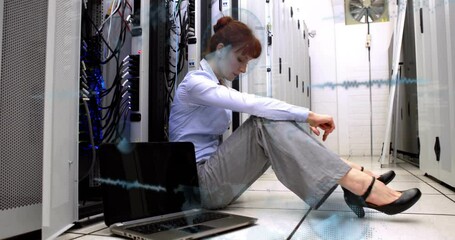 Poster - Sitting on floor in server room, woman using laptop and watching animation