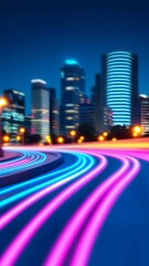 Poster - Lights illuminate a bustling futuristic cityscape with vibrant neon colors and glowing pathways at night