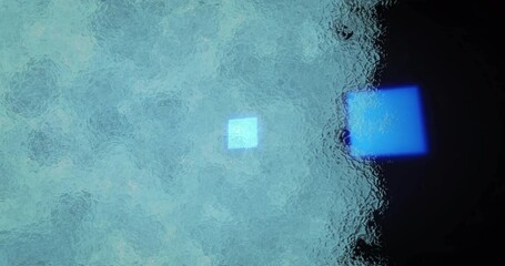Poster - glowing blue squares creating abstract pattern through textured glass surface