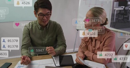 Poster - Discussing work, two colleagues in office with animation of social media notifications