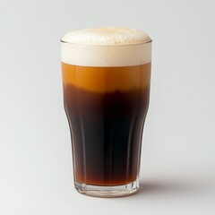 Leinwandbilder - A tall glass of dark beer with a thick, creamy head served on a white surface in a well-lit studio.