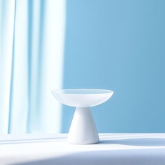 Poster - Minimalist White Pedestal Bowl on Blue Backdrop with Window Light and Shadows, Ideal for Product Showcase