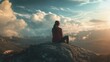 © Crafted - Woman sitting on top of a mountain looking at the view